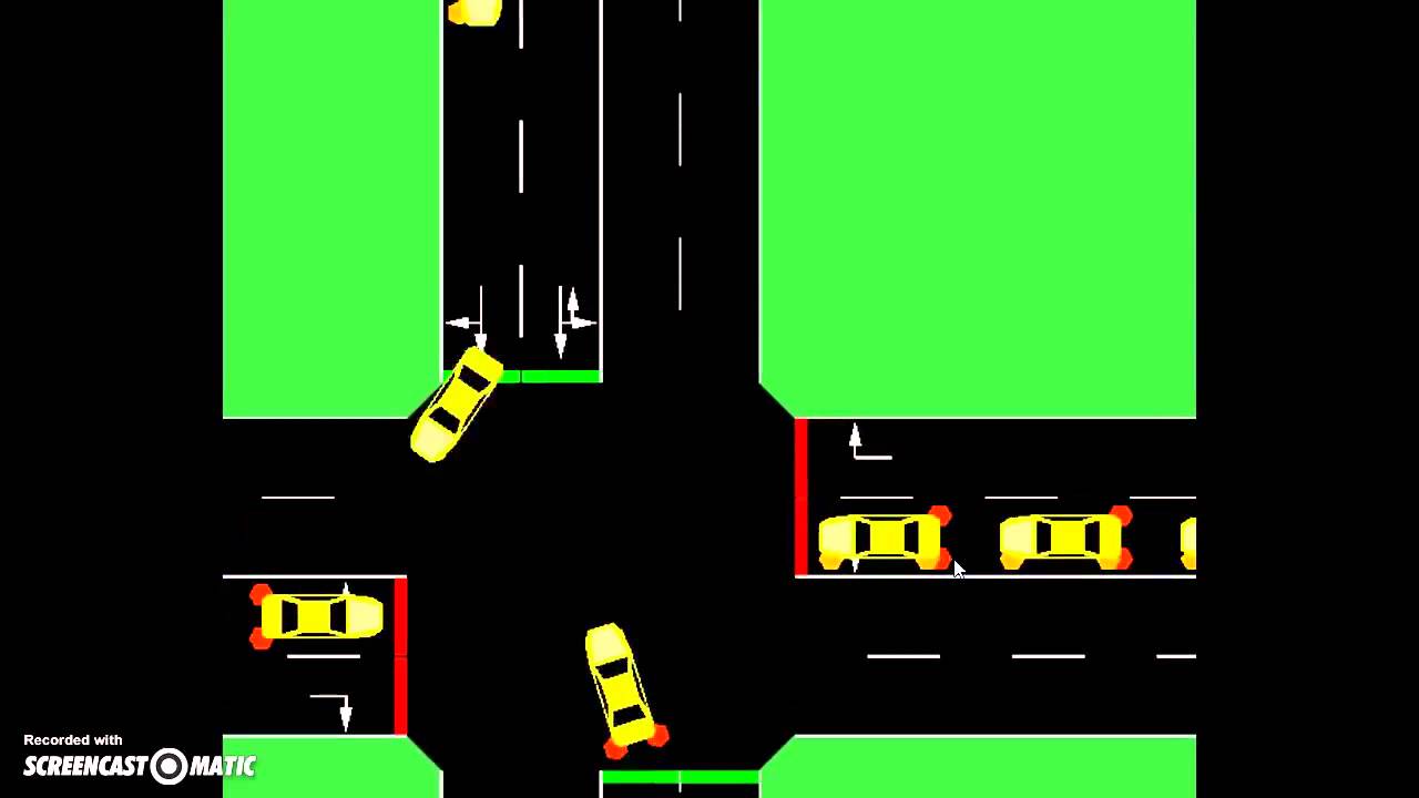 Top-down view of simulated road intersection with vehicles